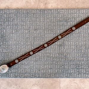 Dark brown leather belt in Western style. Silver buckle with turquoise stones